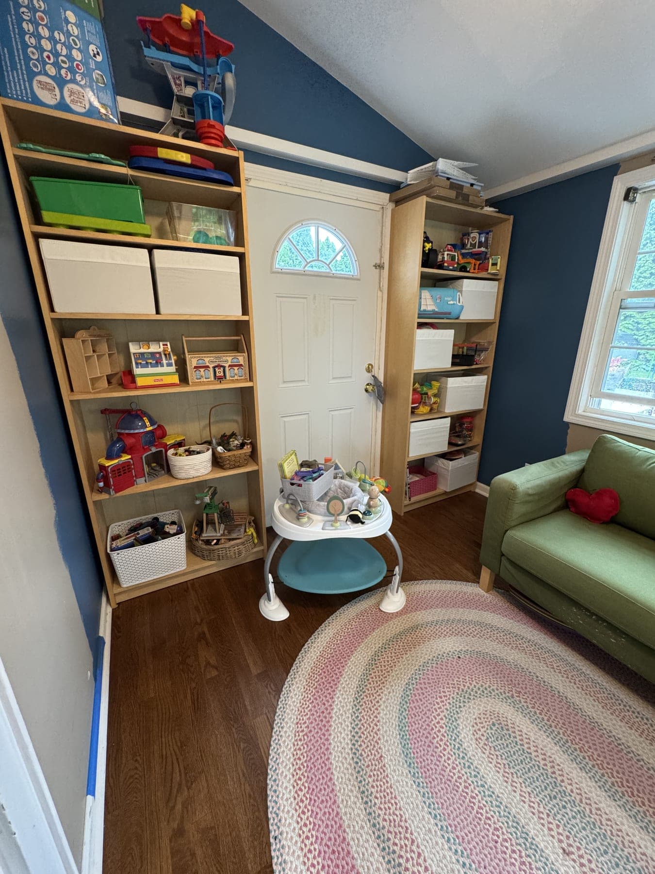Bright playroom with organized shelves and open floor space after an IZEN session